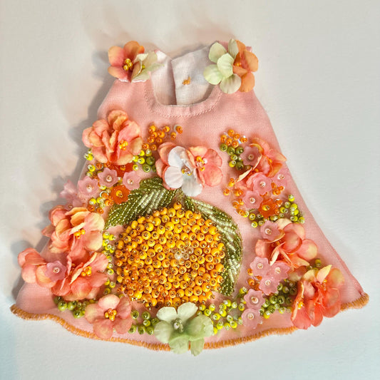 Decorative dress for dolls - OOAK - BJD - with floral and bead embellishments on a light background